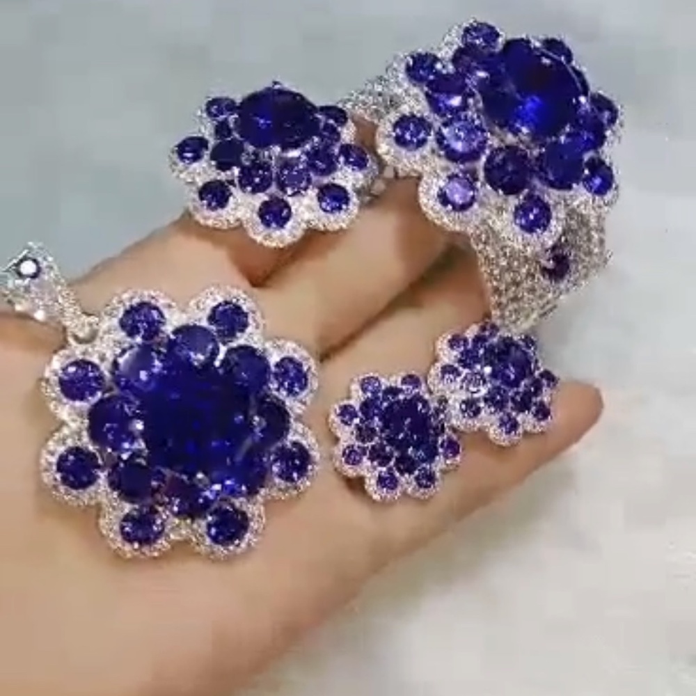 Heavy silver purple stone set